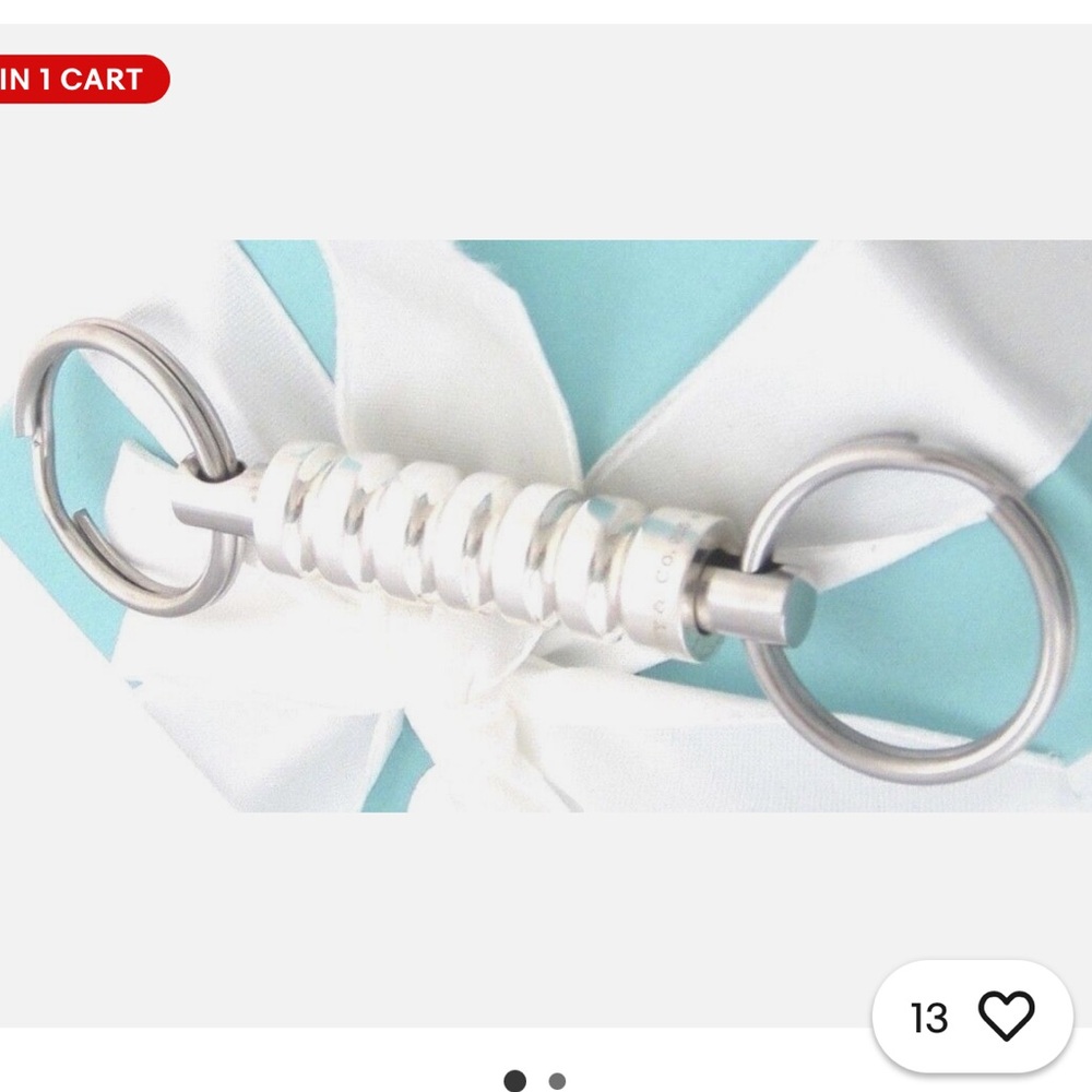 Tiffany & Co. Paloma Picasso Sterling Silver Groove Valet Keychain.